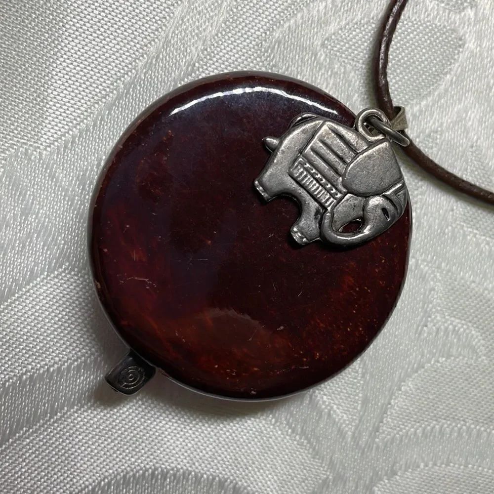 Elephant charm and pendant necklace with elephant toggle clasp on cord